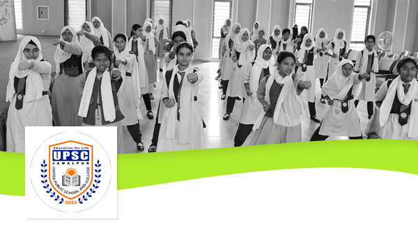 Logo for United Public School & College plus a photo of girls attending the karate classes